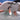 sharp eye surfboard with FCS fins, surfer lifting up in the surf in white water surfing